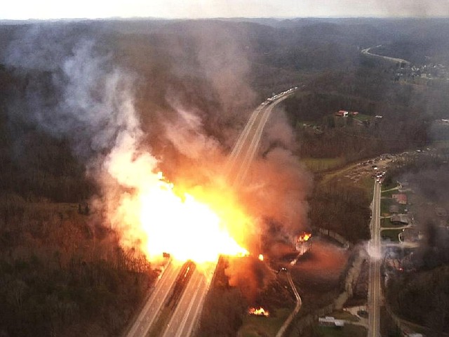 A fireball runs across Interstate 77 from a natural-gas explosion near Sissonville, W. Va., on Tuesday, in this image provided by the West Virginia State Police. 