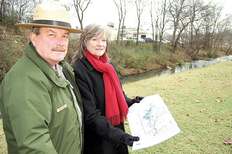 Steve Rudd of the U.S. National Parks Service and Jean Wallace of the Hot Springs Parks and Recreation Department look over a spot near Hot Springs Creek where birdwatchers can take part in the annual Audubon Society Christmas Bird Court in Garland County on Dec. 22. 