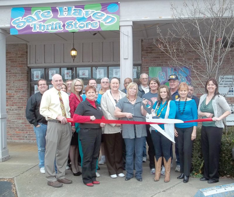 Members of the Cabot Chamber of Commerce and staff from the Safe Haven Thrift Store are shown at the store’s official ribbon-cutting. The store will help raise funds for the Lonoke County Safe Haven shelter.