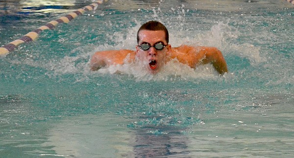 Dillan Raymond, a Springdale High senior, works out Tuesday at the Jones Center in Springdale. Raymond competes in the 100-freestyle and 100-fly events. 