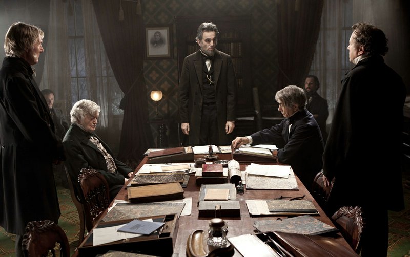 This undated publicity photo released by DreamWorks and Twentieth Century Fox shows Daniel Day-Lewis, center rear, as Abraham Lincoln, in a scene from the film "Lincoln," which was nominated for a Golden Globe for best drama Thursday, Dec. 13, 2012. Daniel Day Lewis was also nominated for best actor. 