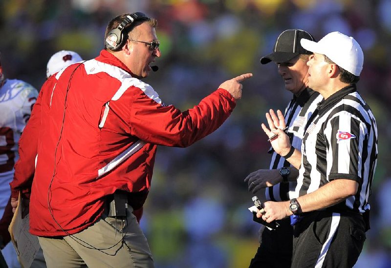 New Arkansas Coach Bret Bielema, shown arguing with an official during last season’s Rose Bowl while the coach at Wisconsin, showed a feisty streak during his high school playing days that has carried over into his coaching career. 