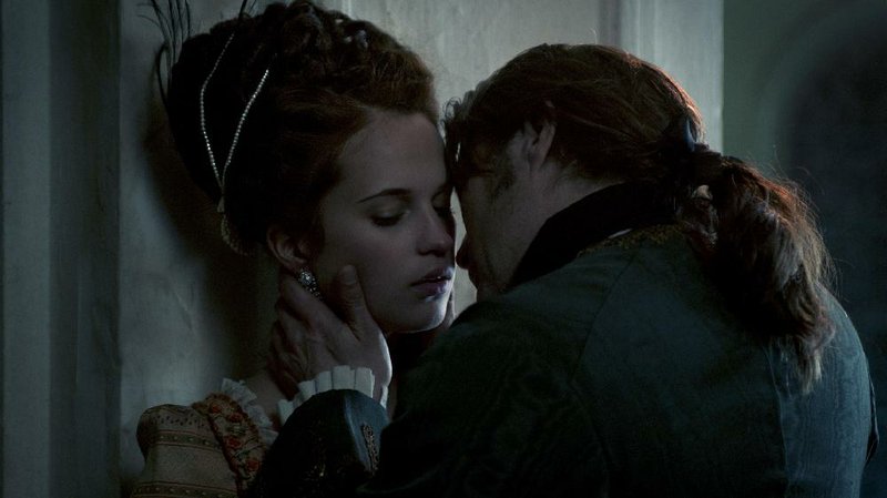 Queen Caroline Mathilde (Alicia Vikander) and her king’s personal physician Johann Struensee (Mads Mikkelsen) have an illicit affair with huge implications for Denmark in the historical drama A Royal Affair. 