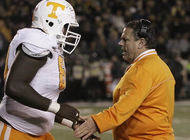 Jim Pittman was named Arkansas' offensive line coach on Thursday after one season at Tennessee. 