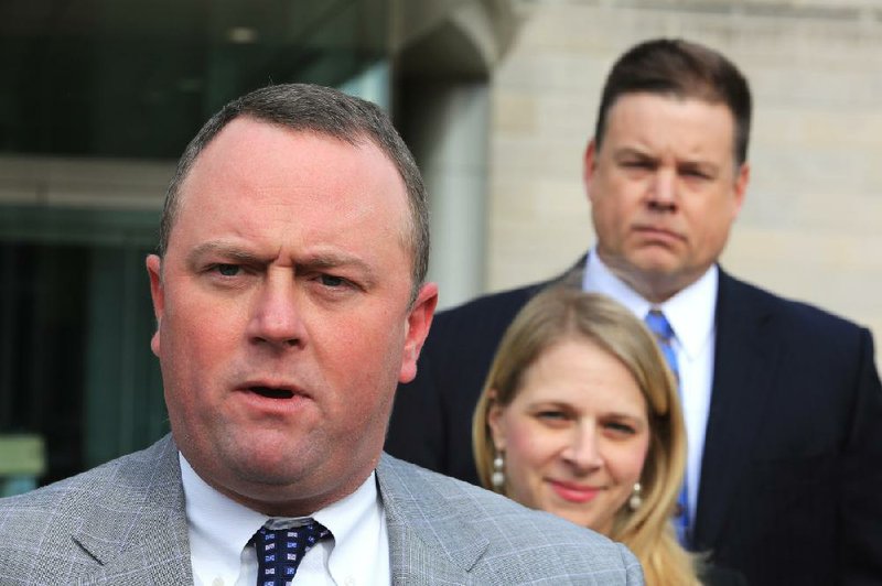 Chris Thyer (left), U.S. attorney for the Eastern District of Arkansas, Assistant U.S. Attorney Julie Peters and FBI Special Agent in Charge Randy Coleman discuss former Helena-West Helena police Lt. Marlene Kalb’s conviction on extortion and attempted-drug-trafficking charges Friday in federal court in Little Rock. The case “sends a strong message that someone who would sell their badge” won’t be tolerated, Thyer said outside the courthouse.

