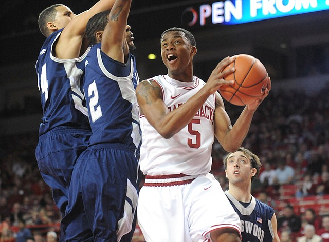 NWA Media/ANDY SHUPE -- Arkansas freshman guard Anthlon Bell (5) against Longwood on Sunday, Nov. 18, 2012, during the first half of play in Bud Walton Arena.