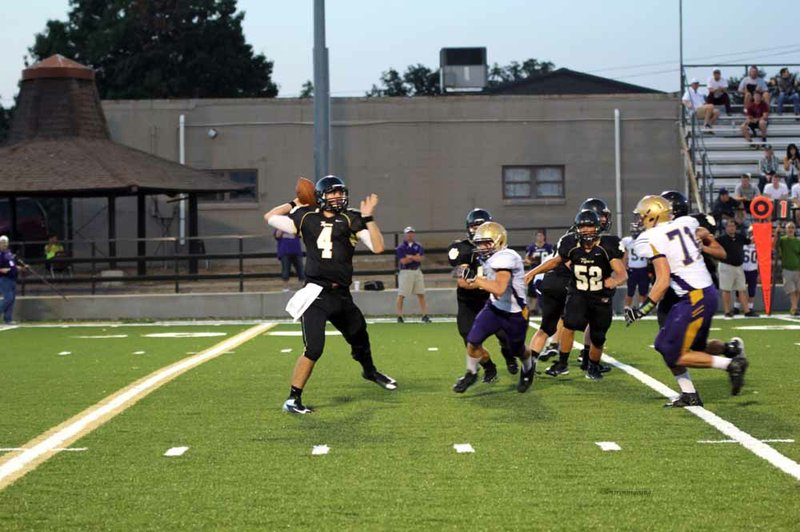 Charleston quarterback Ty Storey (No. 4), at 6-3 and 217 pounds, stood out even before he passed for nearly 4,400 yards and 46 touchdowns.
