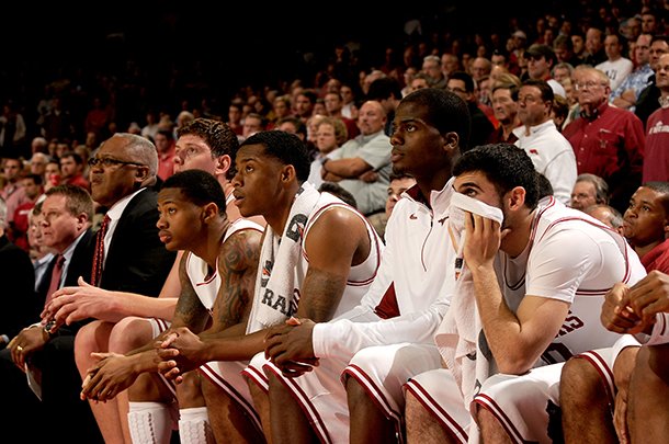 Arkansas' bench looks on during a win over Oklahoma on Dec. 4. 