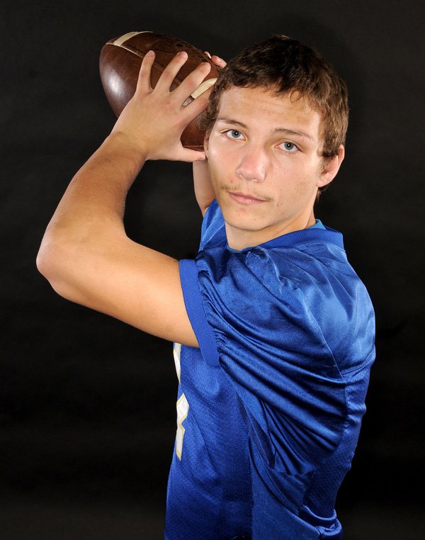 Victor Urquidi of Decatur rushed 184 times for 1,222 yards and 18 touchdowns while completing 53 of 108 passes for 798 yards and eight touchdowns. From his linebacker spot, he had 140 tackles, including 79 solo stops, as the Bulldogs went 5-3 in the Class 2A-4 Conference. 