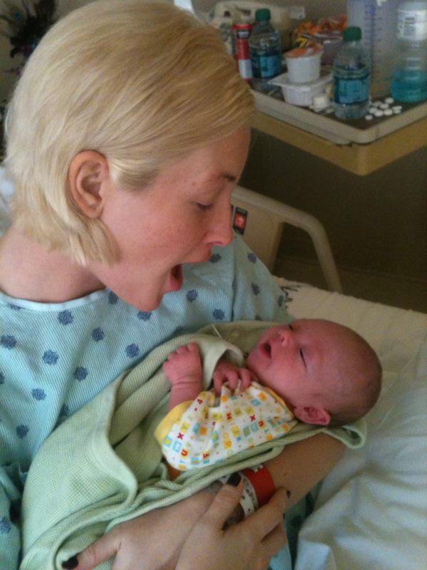 Leslie Harris cradles her newborn son, Ayden, in an oncology ward, where she was undergoing chemotherapy in September 2011. 