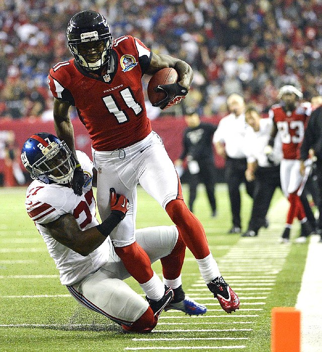 Atlanta Falcons wide receiver Julio Jones (11) caught two touchdown passes from quarterback Matt Ryan on Sunday in a 34-0 victory over the New York Giants in Atlanta. 