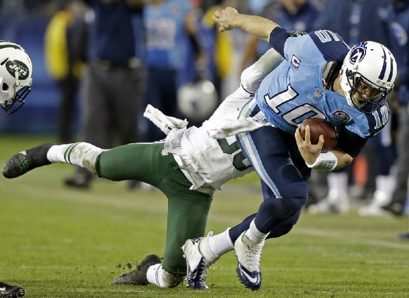 Tennessee quarterback Jake Locker (10) had his first touchdown run of the season to put Tennessee ahead late in the third quarter and the Titans intercepted four passes by Mark Sanchez to snap a three-game skid with a victory in Nashville Tenn., on Monday.
