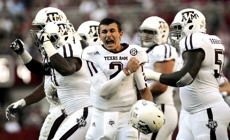 Texas A&M freshman quarterback Johnny Manziel, already the winner of the Heisman Trophy and the Davey O’Brien Award, was named The Associated Press’ Player of the Year on Tuesday. 