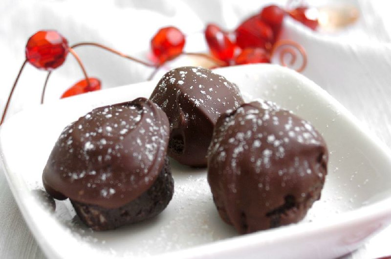 Oreo Truffles combine crushed Oreo cookies, cream cheese and melted chocolate. 
