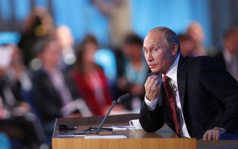 Russian President Vladimir Putin speaks during a news conference in Moscow, Russia, Thursday, Dec. 20, 2012. 