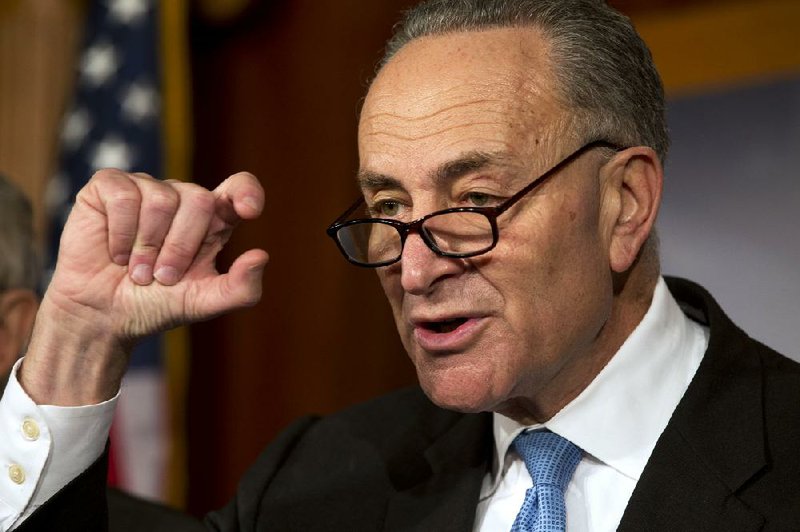 In Washington on Thursday, U.S. Sen. Charles Schumer, D-N.Y., indicates how close he believes lawmakers are to a deal on avoiding the “fiscal cliff.” 