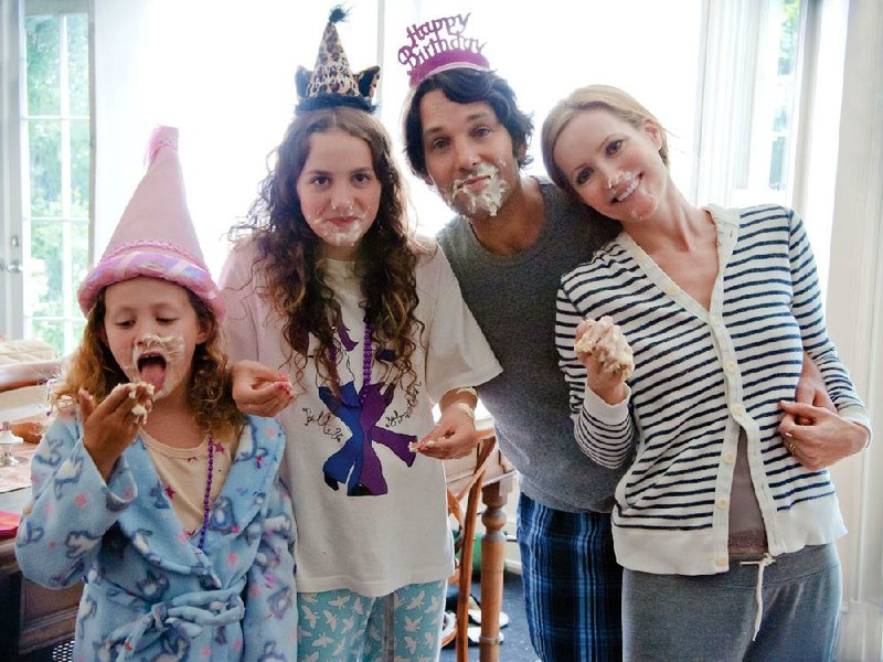 Charlotte (Iris Apatow) and her older sister Sadie (Maude Apatow) help their parents’ Pete (Paul Rudd) and Debbie (Leslie Mann)‚ celebrate a landmark birthday in Judd Apatow’s This Is 40. 
