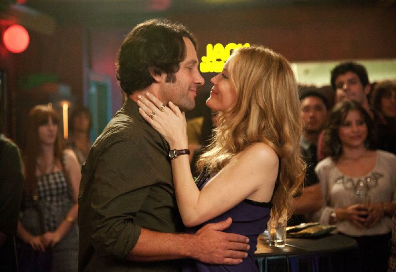 Paul Rudd and Leslie Mann play husband and wife in writer/director Judd Apatow’s This Is 40. The film came in third at last weekend’s box office and made about $12 million. 