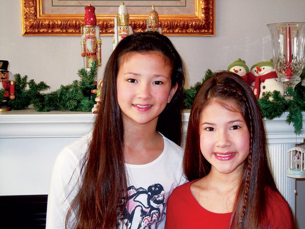 Lillebeth Backes, left, and her sister Brinklee Backes will be two of the local children in the Moscow Classical Ballet’s “The Nutcracker” at the Walton Arts Center. 