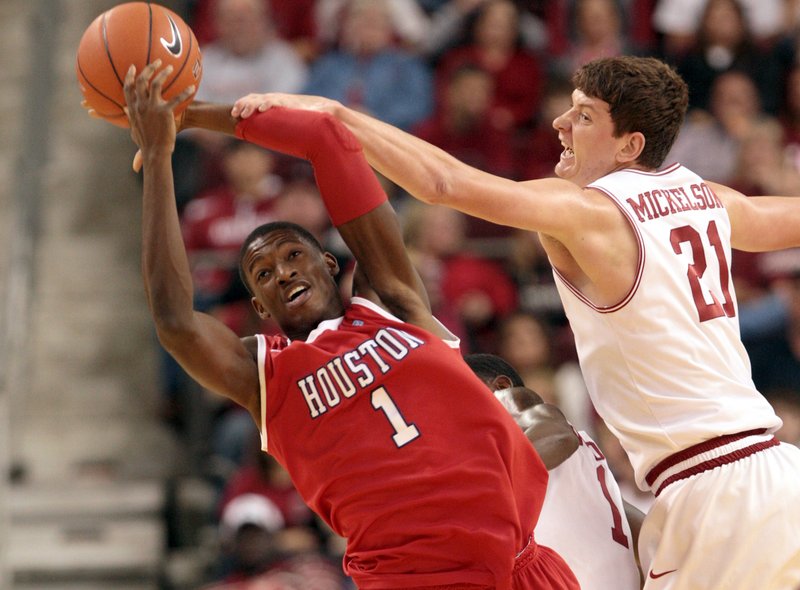 Sophomore forward Hunter Mickelson, who scored a career-high 16 points against Robert Morris, said the players understand they need to stay sharp tonight. Mickelson blocks a shot during Arkansas' game against Houston last November at Verizon Arena. The Razorbacks have lost three straight games in North Little Rock.