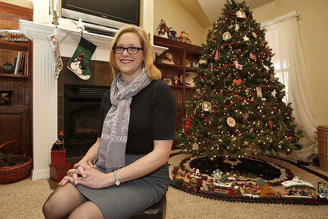 Natalie Burchit in her favorite personal space, the decorated living room of her Bella Vista home.