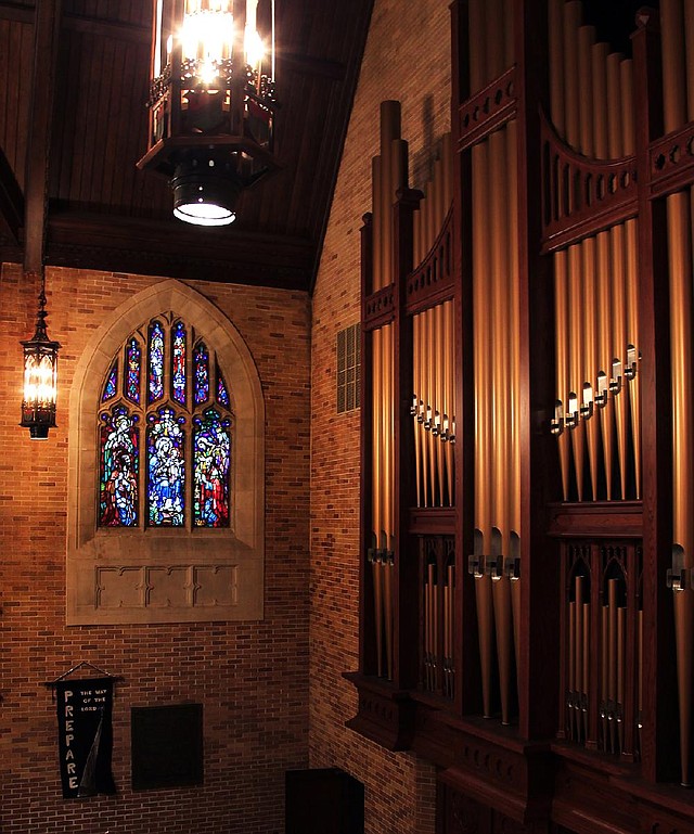 The Nativity window at First Presbyterian Church in downtown Little Rock includes three large panels — shepherds on one side, wise men on the other, and Mary and Jesus in the center. 