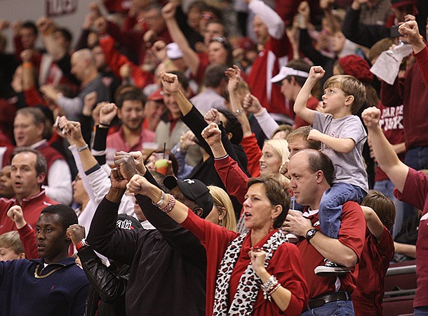 Fans call the hogs during the second half Saturday night at Verizon Arena in North Little Rock. 