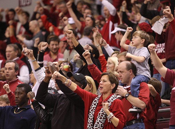 Fans call the hogs during the second half Saturday night at Verizon Arena in North Little Rock. 