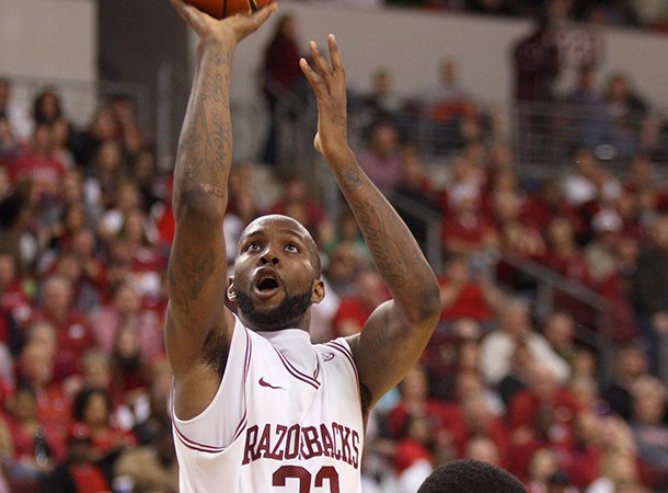 Arkansas' Marshawn Powell drives to the basket in the second half against Alabama A&M's Saturday night at Verizon Arena in North Little Rock. He finished with 20 points.
