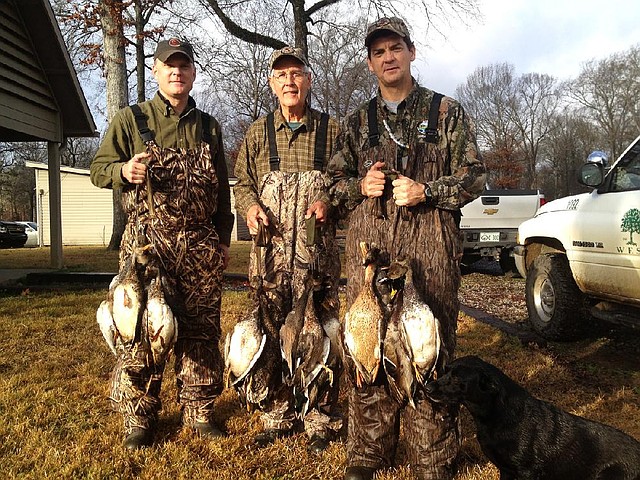 Enjoying a mixed bag duck hunt Monday in Arkansas County were (from left) Nat Lea, Dorsey Jackson and Ford Overton. While mallards were scarce, the trio — joined by the author — still were able to gather a limit by 8 a.m. 