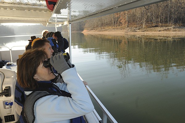 Passengers look for eagles on one of the cruises hosted by Hobbs State Park-Conservation Area. A cruise is set for 3 p.m. today. 