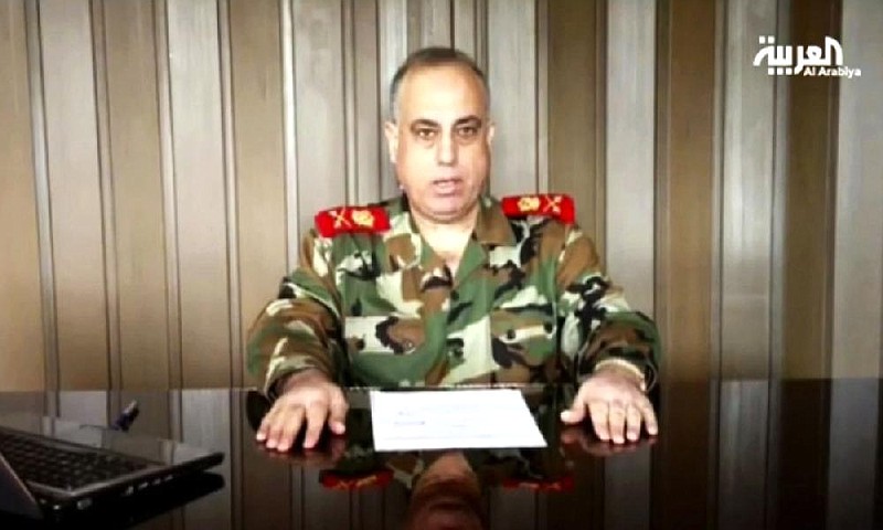 In this image made from video broadcast on Al Arabiya TV late Tuesday, Dec. 25, 2012, Syrian Maj. Gen. Abdul-Aziz Jassem al-Shallal makes remarks saying he is joining "the people's revolution."  The general who heads Syria's military police has defected and joined the uprising against President Bashar Assad's regime, one of the highest walkouts by a serving security chief during the country's 21-month uprising, a pan Arab TV station has reported.(AP Photo/Al Arabiya via AP video)TV OUT NO SALES