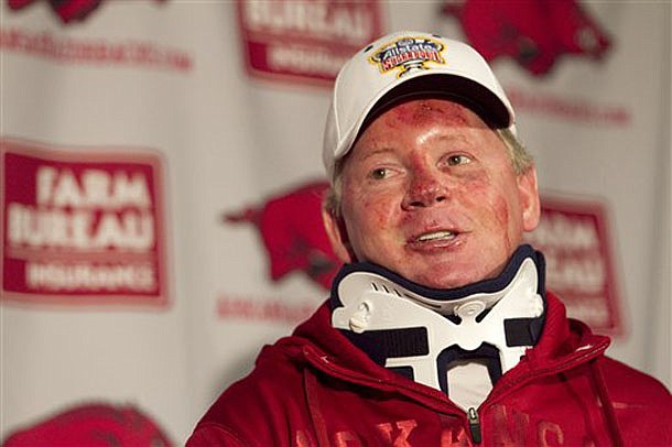Arkansas football coach Bobby Petrino speaks during a news conference in Fayetteville on Tuesday, April 3, 2012, after being released from a hospital. 