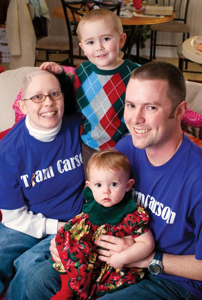 Patti, left, and Jeremy Carson, right, are shown with their children, Johnathan, standing, and Kelsey. Patti Carson has a rare form of cancer that caused tumors throughout her body, including two in her brain. She received her last chemotherapy treatment on Christmas Eve. During Patti’s battle with the disease, the Carsons said, they’ve received support from various facets of their community, displayed by people wearing Team Carson shirts.