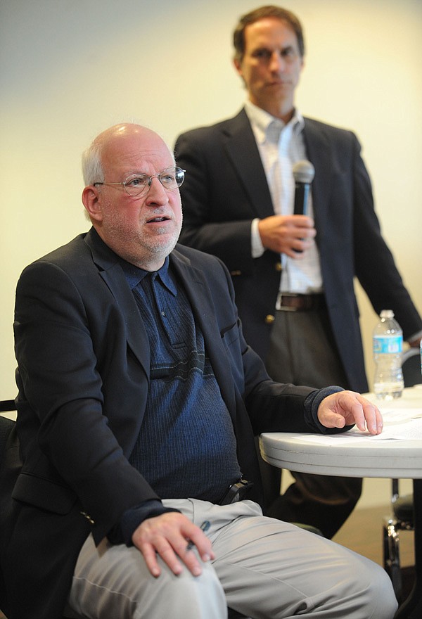 Rob Gershon, chief clinical officer at Ozark Guidance, left, speaks Thursday alongside Tom Petrizzo, Ozark Guidance CEO, during a public forum sponsored by Ozark Guidance at the Jones Center in Springdale. 