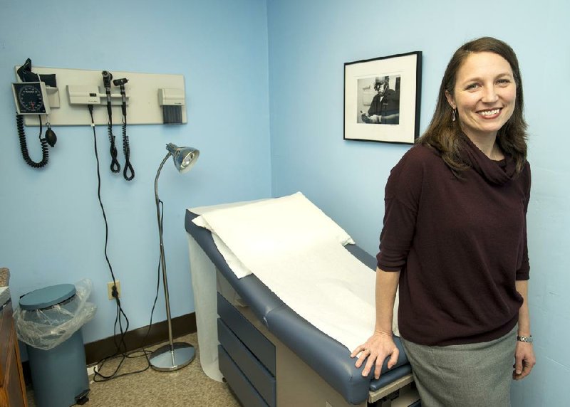 Amy Johnson volunteers at Harmony Health Clinic to provide free health care to those who lack insurance. 