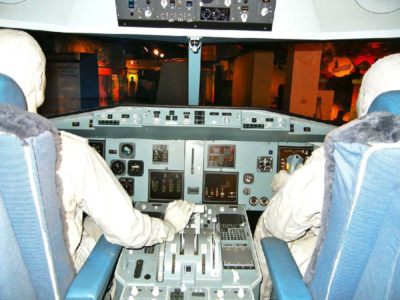At the American Airlines C.R. Smith Museum, visitors can view the interior of a cockpit. 