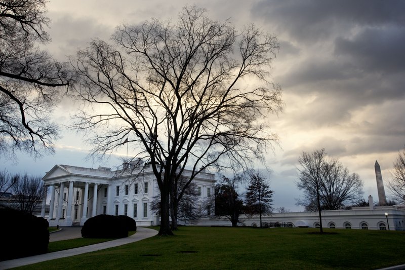 Clouds roil over the White House in Washington on the morning of Sunday, Dec. 30, 2012, as Washington has less than 48 hours to avert the “fiscal cliff,” a series of tax increases and spending cuts set to take hold on Jan. 1. Republican and Democratic negotiators in the Senate were hoping to reach a deal to avoid going over the cliff on Sunday. 