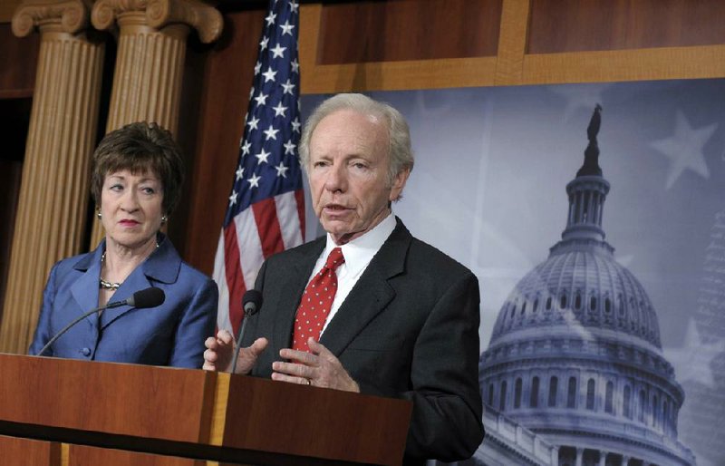 Senate Homeland Security Committee Chairman Sen. Joseph Lieberman, I-Conn., accompanied by the committee’s ranking Republican, Sen. Susan Collins of Maine, speaks during a Washington news conference Monday about the committee’s report on the security deficiencies at the temporary U.S. mission in Benghazi, Libya. 