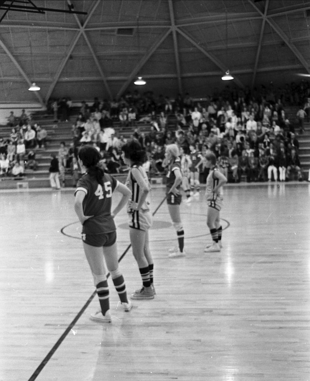 Before 1979, girls basketball in Arkansas was played halfcourt three-on-three. Players could not cross the center line. In this photo taken at the West Fork Tournament on Feb. 26. 1972, players stand at midcourt waiting on the ball to get to their end of the court. 