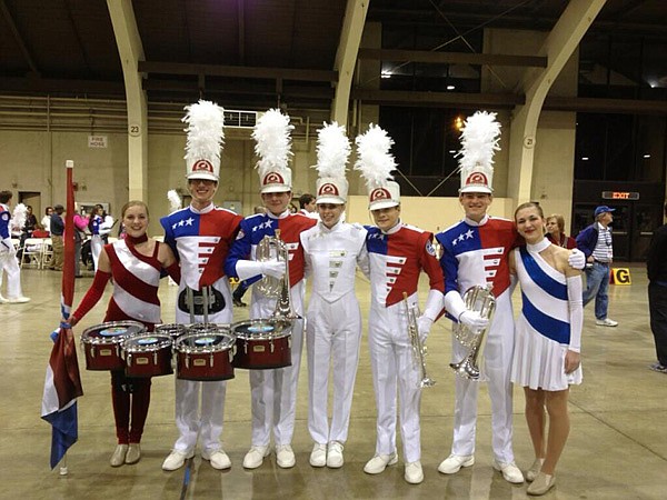 Members of the Bentonville High School Band will be marching in today’s 124th Rose Parade as a part of the Bands of America honors band. Participants, from left, are Monica Gates, color guard; Matt Hall, percussion; Byron Marciniak, baritone; Julianne Clements, drum major; Jackson Urhahn, trumpet; Devin Brooksby, baritone; and Melissa Wadley, dancer. 