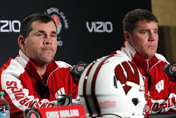 Wisconsin defensive coordinators Charlie Partridge, left, and Chris Ash answer questions during a news conference in Los Angeles on Friday, Dec. 28, 2012. (AP Photo/Nick Ut)