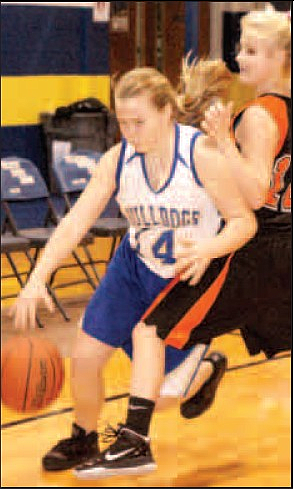 Decatur junior Hannah Ramsey moved the ball down the court during last month’s home game against the Watts Engineers. 