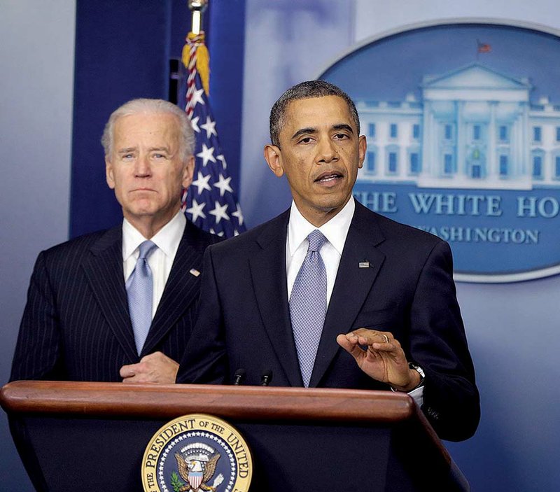 President Barack Obama, with Vice President Joe Biden, talks about the House passing the “ÿscal cliff” bill on Tuesday. Despite last-minute hedging by GOP leaders over higher taxes and a pullback from spending cuts in the budget legislation passed by the Senate early Tuesday morning, the House passed it late Tuesday night. 