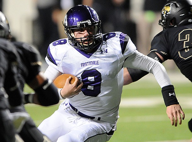 Austin Allen scrambles during Fayetteville's Class 7A state championship game win over Bentonville at War Memorial Stadium in December. 