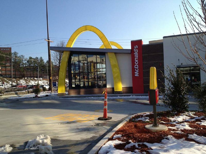 Golden arches are part of the “tribute” architecture at the new McDonald’s, 104 S. University Ave., Little Rock. 