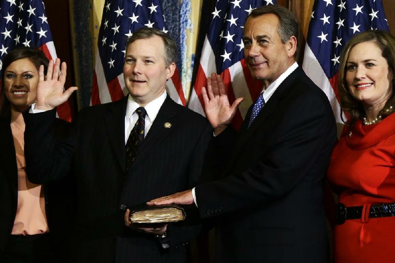 Rep. Tim Griffin, a Little Rock Republican, said Obama was “doing his darndest to scare the American people simply for political gain.”  Here he is shown with House Speaker John Boehner (right) in January.