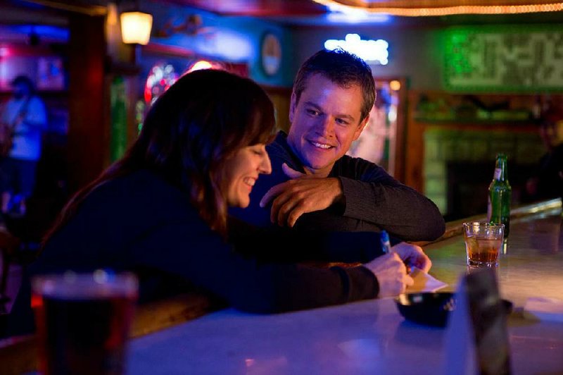 Schoolteacher Alice (Rosemarie DeWitt) shares a cocktail and a moment with gas company land man Steve Butler (Matt Damon) in Gus Van Sant’s Promised Land. 