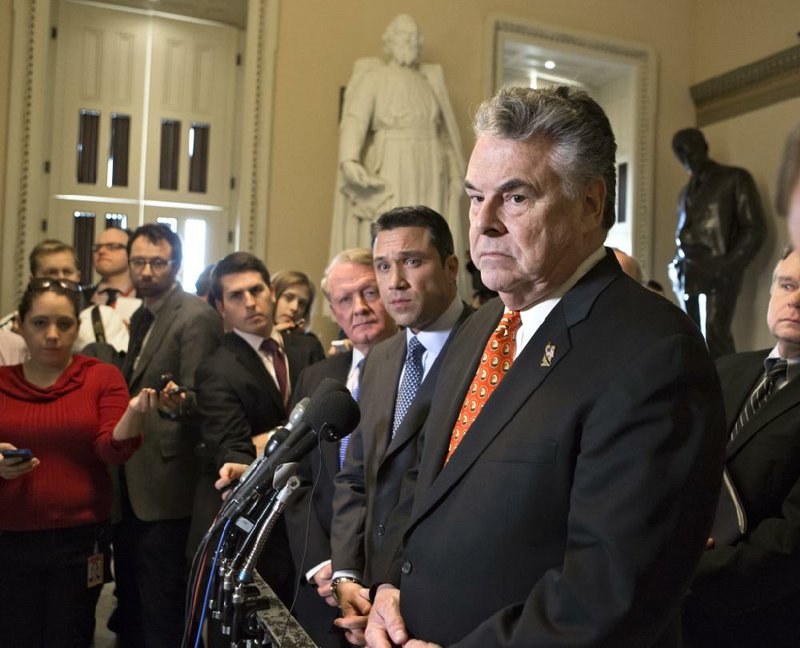 Rep. Peter King, R-N.Y., right, accompanied by fellow lawmakers, speak to reporters on Capitol Hill in Washington, Wednesday, Jan. 2, 2013, after a meeting with House Speaker John Boehner of Ohio, over the delayed vote on aid for the victims of Superstorm Sandy. From left are, Rep. Leonard Lance, R-N.J., Rep. Michael Grimm, R-N.Y., and King. (AP Photo/J. Scott Applewhite)