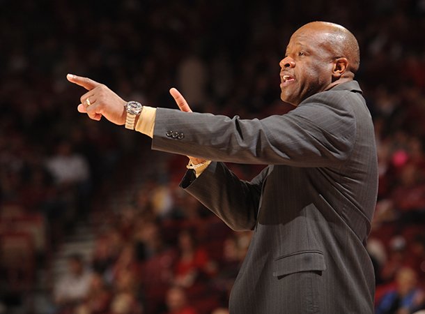 NWA Media/ANDY SHUPE -- Arkansas coach Mike Anderson directs his players Saturday, Jan. 5, 2013, during the second half of play against Delaware State in Bud Walton Arena in Fayetteville.